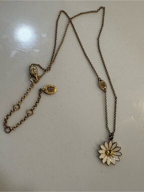 Juicy Couture Gold Daisy Pendant Necklace with White Enamel Petals